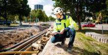 An employee of Lappeenranta Energia at the infrastructure site in site equipment.